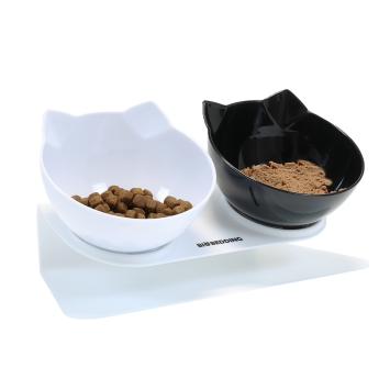 Kattenvoerbak met zwarte en witte kommen