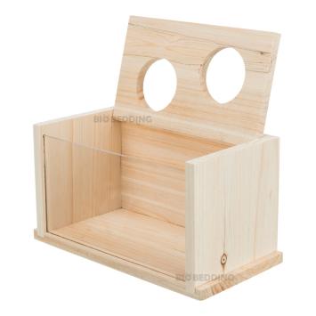 Zandbad van hout met twee ronde openingen